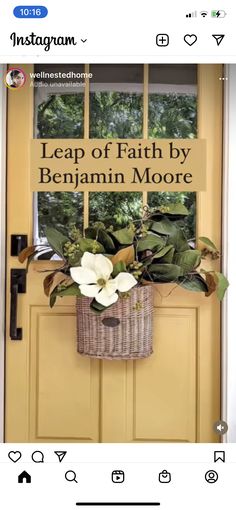 the front door is decorated with flowers and greenery for faith by benjamin moore