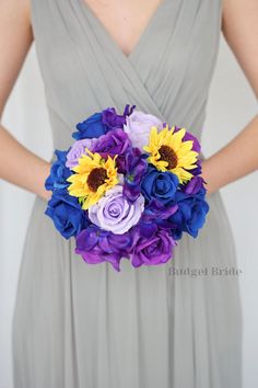 a bridesmaid's bouquet with sunflowers and purple roses