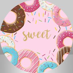 a plate with donuts and sprinkles on it that says sweet one