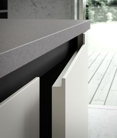 a close up of a counter top with a door in the background