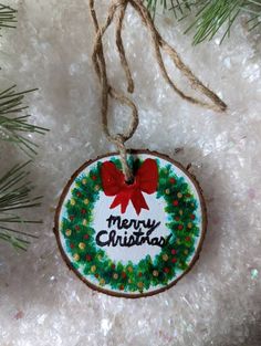 a christmas ornament hanging from a tree