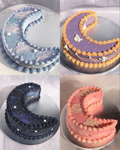 there are four cakes decorated with different designs on the cake platter, and one is shaped like a crescent