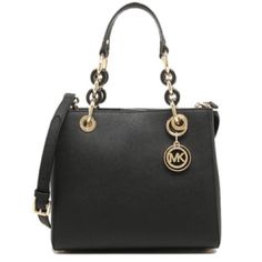 Genuine Scratch Resistant Saffiano Leather In Classy Black Color Adds A Sleek Finishing Touch To This Chic Satchel Bag From Michael Michael Kors. The Michael Michael Kors Cynthia Small Satchel Is Made From Textured Saffiano Leather With Magnetic Snap Closure, Long Crossbody Shoulder Strap And Mk Signature Gold Tone Logo Medallion On The Front. This Satchel Bag Has A Fully Lined Interior That Includes A Key Clip, A Back Wall Zipper Pocket, Multipurpose Slide Pockets, And A Zip Pocket In The Middl Classic Saffiano Leather Bag With Metal Logo, Luxury Saffiano Leather Bag With Metal Logo, Michael Kors Shoulder Bag With Metal Logo, Elegant Saffiano Leather Bag With Metal Logo, Elegant Michael Kors Bags With Metal Logo, Michael Kors Black Saffiano Leather Bag, Everyday Saffiano Leather Bag With Chain Strap, Saffiano Leather Bags With Chain Strap For Everyday Use, Formal Saffiano Leather Bag With Chain Strap