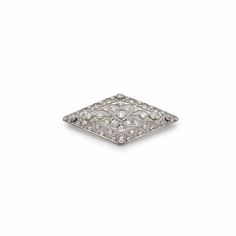 Antique Diamond and Platinum Patterned Brooch – Jewels Aficionado Platinum Brooches With Single Cut Diamonds In White Gold, White Gold Brooches With Single Cut Diamonds In Platinum, Luxury Diamond Brooches In White Gold, Luxury White Gold Brooches With Diamond Accents, Luxury White Gold Diamond Brooches, Vintage Platinum Brooches With Diamond Accents, Art Deco Platinum Brooches In White Gold, Art Deco White Gold Brooch In Platinum, Art Deco White Gold Platinum Brooches