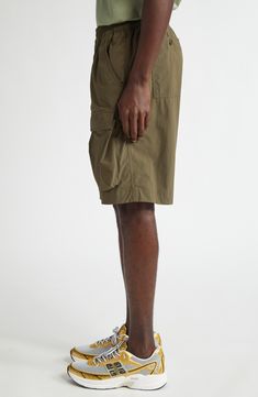 An ideal blend of function and fashion, these cargo shorts feature an elasticized waist, capacious pockets and a knee-grazing Bermuda silhouette. 10 1/2" inseam; 24" leg opening; 12" front rise; 17 1/2" back rise (size 50EU) Elastic waist Front scoop pockets; back button-welt pockets; cargo flap-patch pockets 85% polyamide, 15% elastane Hand wash, dry flat Made in Portugal Designer Clothing Utility Bermuda Bottoms With Built-in Shorts, Utility Bermuda Shorts With Built-in Shorts, Summer Knee-length Cargo Pants With Built-in Shorts, Outdoor Cargo Bermuda Shorts, Outdoor Cargo Pocket Bermuda Shorts, Bermuda Shorts With Side Pockets For Outdoor Activities, Outdoor Relaxed Fit Cargo Pants With Built-in Shorts, Bermuda Shorts With Side Pockets For Outdoor, Functional Short Length Bottoms With Pockets