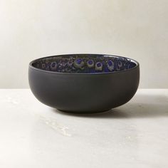 Statement-making soup bowl suits special occasions with its glossy cobalt blue finish. Accented with a reactive glaze around the rim, the bowl is marked by striking tonal variations and crackles in the glaze produced during firing. Part of the Cordelia cobalt blue dinnerware collection. CB2 exclusive.  -Stoneware with glossy cobalt blue finish -Reactive glaze on rim -Each piece will vary in glaze coloring and tone -Microwave-safe -Hand-wash only Cordelia Cobalt Blue Soup Bowl Making Soup, Blue Dinnerware, Pasta Soup, Reactive Glaze, Porcelain Ceramics, Soup Bowl, Ceramic Bowls, Crate And Barrel, Hand Washing