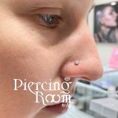 a close up of a person's nose with piercing room on the bottom corner