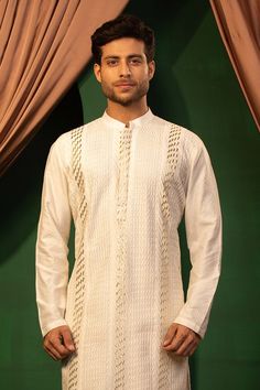 White kurta with hand embroidery and gota dori work. Paired with a plain pant. - Aza Fashions Cotton Bandhgala With Zari Work For Puja, Cotton Bandhgala With Gota Work For Festivals, Festival Cotton Bandhgala With Gota Work, Long Sleeve Kurta With Gota Work For Puja, Traditional Long Sleeve Wear With Gota Work For Puja, Long Sleeve Traditional Wear With Gota Work For Puja, Traditional Wear With Gota Work For Puja, Traditional Cotton Sherwani With Gota Work, Long Sleeve Sherwani With Gota Work For Puja