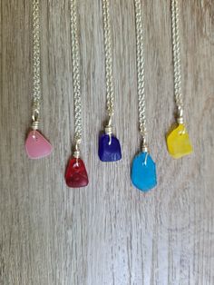 Adorn your neck with this unique minimalist necklace made from genuine rare colored sea glass. The pendants are small and measure about 1 inch. The sea glass is 1/2 to 3/4 of an inch. It comes on a sterling silver 18 inch chain. Choose from red, pink, yellow, turquoise, and cobalt blue. This comes in a box and is ready to gift. Minimalist Nickel-free Sea Glass Jewelry, Minimalist Nickel Free Sea Glass Jewelry, Minimalist Handmade Necklaces With Recycled Glass, Minimalist Handmade Necklace With Recycled Glass, Minimalist Recycled Glass Necklaces For Gifts, Minimalist Everyday Glass Necklace, Minimalist Recycled Glass Jewelry For Gifts, Yellow Turquoise, Sea Glass Necklace