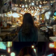 two different pictures one is blurry and the other has bright lights above it in an open market