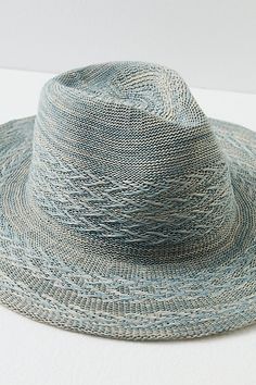 Add an effortless detail to your outfits with this sleek wide brim hat, featured in a packable design so you can look chic anywhere the wind takes you. **Features:** Structured style, packable design, woven fabrication, dipped crown, wide brim **Why We | Arrow Woven Packable Hat by Free People in Grey Trendy Packable Sun Hat With Curved Brim, Chic Packable Sun Hat With Curved Brim, Chic Curved Brim Packable Sun Hat, Chic Sun Hat With Curved Brim And Foldable Design, Chic Packable Brimmed Sun Hat, Spring Packable Hat With Curved Brim, Packable Curved Brim Hat For Spring, Chic Packable Sun Hat For Spring, Lightweight Fedora Sun Hat For Spring