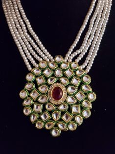 "This is a stunning handmade necklace perfect for high end Jewelry Collector, a keeper in Traditional Vintage Indian/Pakistani Bridal jewelry and a Luxury Gift for your Daughter, Sister or Wife on Wedding or Anniversary. Perfect for any type of occasions, weddings And celebrations and a beautiful & memorable gift for weddings and special occasions. -Pearl Necklace Set with Earrings. -Designer multi layered pearl necklace. -Gold Plated Set with Kundan Stones which shine like Polki Diamonds. - Handmade Round Bridal Necklace For Wedding, Handmade Bridal Necklace For Wedding, Elegant Kundan Necklace With Round Pendant For Wedding, Bollywood Style Pearl Pendant Jewelry For Celebration, Green Round Pendant Jewelry For Wedding, Handmade Round Pendant Wedding Jewelry, Bollywood Style Pearl Pendant Wedding Jewelry, Festive Round Pendant Necklace For Wedding, Festive Round Bridal Necklace With Jewels