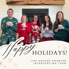 a group of people in matching christmas pajamas holding mugs