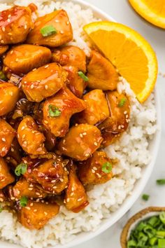 a white bowl filled with orange chicken and rice