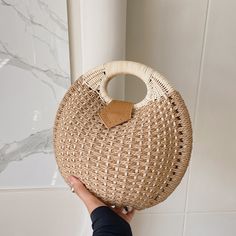 Straw rattan bags are the perfect fashion accessory to wear everywhere, anytime. This Woven Rattan Round Shaped Handbag is carefully designed and handmade by artisans from all over the world. Rattan Bags, Rattan Bag, Woman Weaving, Woven Rattan, Straw Bag, Straw, Fashion Accessories, The World, How To Wear