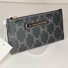 H By Halston Faux Leather Wallet Nwt Black And Gray Snap Close Zip Pocket Id Window 5 Card Slots 2 Slot Pockets Gold Tone Hardware Measures: 6" X 3.5" X 1" Gray Bags With Card Slots For Everyday Use, Everyday Gray Bag With Card Slots, Gray Bags With Card Slots For Daily Use, Gray Wallets With Zipper Closure For Everyday Use, Luxury Wallets With Silver-tone Hardware For Formal Occasions, Black Wallets With Gold-tone Hardware, Designer Black Wallet With Gold-tone Hardware, Luxury Leather Wallets With Silver-tone Hardware, Luxury Leather Wallet With Silver-tone Logo