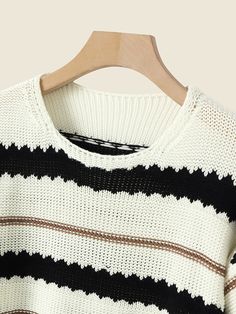 Stripe Knit Loose Long Sleeve Casual Crew Neck Sweater Striped Knitted Tops For Layering, Cozy Striped Knitted Tops, Cozy Knitted Striped Tops, Striped Open Knit Sweater For Fall, Striped Open Knit Top, Textured Knit Striped Sweater, Textured Knit Acrylic Crew Neck Top, Acrylic Textured Knit Crew Neck Top, Striped Open Knit Long Sleeve Sweater