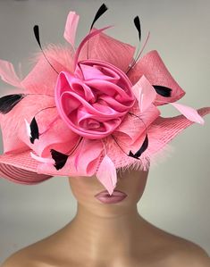 This hat is a very elegant and sophisticated coral colored straw hat. A beautiful design featuring a large flower made from loops, swirls and leaves sits on the brim of the hat. Perfect hat for Easter ,church or for the Kentucky Derby. Stunning for a wedding party or tea party.  The hat  also has a Downton Abby feel to it . Beautiful for a tea party, wedding party, gala, or any other special occasion hat. You will love it! Brim: 4" Rise: 4" Size: Internal Draw String to adjust to any size head Pink Cloche Fascinator For Church, Pink Cloche Mini Hat For Evening, Pink Straw Hat For Summer Parties, Pink Summer Party Straw Hat, Pink Cloche Fascinator For Party, Fedora Straw Hat For Party At Royal Ascot, Elegant Pink Cloche Fascinator, Elegant Pink Straw Hat For Summer, Elegant Pink Cloche Mini Hat