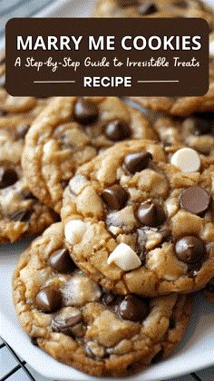 many cookies on a white plate with chocolate chips and marshmallows