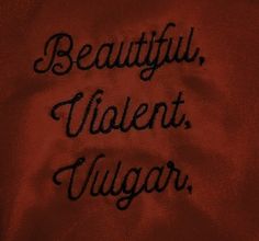 the words beautiful, valent, yugar written in cursive writing on a red cloth