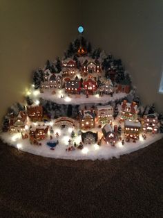 a christmas tree made out of small houses