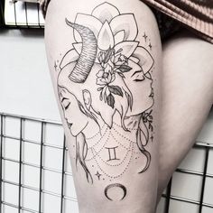 a woman's thigh with tattoos on it