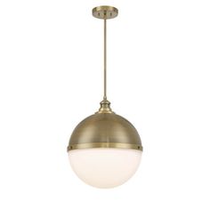 a brass colored light fixture with a white glass ball hanging from it's side