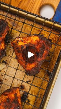 four pieces of food sitting on top of a cooling rack