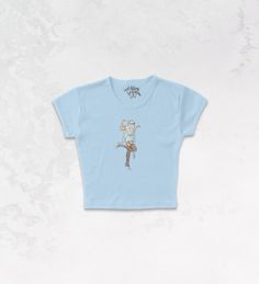 Fitted Graphic Tee With Cartoon Print, Cute Fitted Tops With Cartoon Print, Playful Fitted Graphic Print Tops, Playful Fitted Top With Graphic Print, Playful Fitted Crew Neck Top, Fun Fitted Short Sleeve Tops, Fun Fitted T-shirt With Screen Print, Fitted Playful T-shirt With Cartoon Print, Fitted Graphic Tee With Character Print