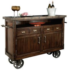 a wooden buffet cart with two wine glasses on top