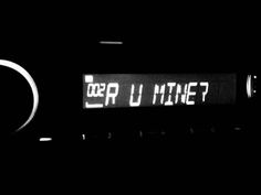 a black and white photo of an electronic device with the words'er u mine?'written on it