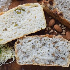 some bread and nuts are on a cutting board