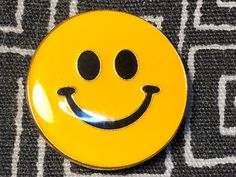 "Smiley face enamel pin measures about 1\" colors yellow, black and gold features a smiley face  this vintage pin would look great on cap, hat, bag, purse, visor, backpack, denim or leather jacket check out my shop for more vintage pins and take advantage of free shipping" High Smiley Face, Classic Smiley Face, Smiley Face Mask, Smile Wallpapers, Playful Snapback Hat With Smiley Face, Kidcore Smiley Face, Smiley Face Patch, Smile Wallpaper