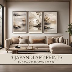 three japanese art prints hanging on the wall above a couch and coffee table in a living room