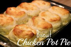 a casserole dish filled with biscuits and chicken pot pie