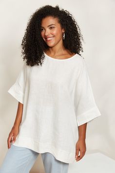 STYLE DETAILS: Whether you're heading to the office or enjoying a leisurely lunch al fresco, the Seraphic Relaxed Top brings casual refinement to your wardrobe. Crafted with the modern woman in mind, it features a modest round neck and chic elbow-length sleeves, all in a sleek linen fabrication. Pair this relaxed silhouette with linen pants and simple accessories for a chic summertime look. FEATURES: Round neck Elbow-length sleeves Relaxed fit Plain Material: 100% Linen Print Material: 55% Linen, 45% Viscose One Size Linen Bottoms, Simple Accessories, Unique Fits, Mid Dresses, Mid Length Dresses, Skirt Leggings, Elbow Length Sleeve, Linen Top, Basic Tops