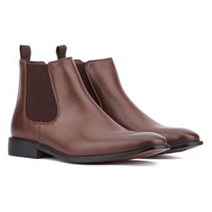 Introducing the Harrison, the ultimate Fall Chelsea boot that epitomizes sophisticated style. Crafted with a sleek faux leather upper, this boot features classic gores on each side and a convenient pull tab for easy on and off access. Perfect for everyday wear, the Harrison combines timeless design with modern comfort, making it your go to choice for the season. Elevate your fall wardrobe with the Harrison Chelsea boot, where elegance meets practicality. Fitted Snip Toe Chelsea Boots For Business, Fitted Brown Chelsea Ankle Boots, Business Chelsea Ankle Boots, Fitted Brown Chelsea Boots For Work, Fitted Business Chelsea Ankle Boots, Fitted Chelsea Ankle Boots For Business, Fitted Ankle Chelsea Boots For Business, Fitted Chelsea Boots With Plain Toe For Fall, Fitted Brown Chelsea Boots For Business