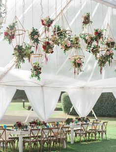 an instagram page with flowers hanging from the ceiling