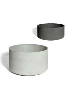 two white and grey bowls sitting next to each other on a white surface with one black bowl in the middle