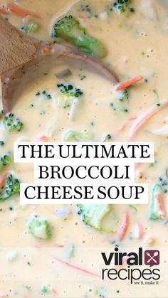 broccoli and cheese soup in a pot with a wooden spoon