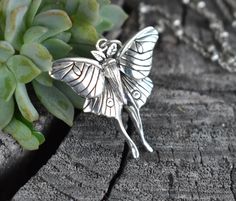 Sterling Silver Luna Moth Necklace details:-Solid .925 sterling silver-Charm measures 28mm x 24mm-Three chain designs to choose from: Bead/Satellite Bead/or Oval Cable chain-Spring Ring clasp closure-Layers easily with other necklaces!Connect with us on Instagram @a_wild_violet for sales and giveaways!**All items are in stock and ship within 2-5 business days from received payment (excluding Saturday/Sunday) from the US. If you are within the US please expect 3-7 business days for shipping trans Bohemian Butterfly Nickel-free Jewelry, Bohemian Butterfly Sterling Silver Necklace, Adjustable Silver Butterfly Pendant Necklace, Bohemian Sterling Silver Butterfly Necklace, Silver Adjustable Butterfly Pendant Necklace, Unique Silver Butterfly Pendant Necklace, Handmade Silver Butterfly Necklace, Unique Handmade Silver Butterfly Necklace, Silver Butterfly Jewelry For Jewelry Making