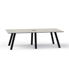 a white table with black legs on an isolated surface in front of a white background