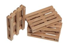 several wooden pallets stacked on top of each other