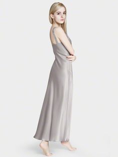 An elegant silk long nightgown that isn't just for the bedroom. Luxuriously crafted in fine Mulberry silk for a lustrous and effortless drape on the body, it's decorated with a plunging neckline giving it a premium romantic feel. Sleek Satin Silk Floor-length Dress, Night V-neck Dress With Satin Finish, Floor-length Modal Satin Slip Dress, Elegant Silk V-neck Gown, Sleek Silk Maxi Gown, Sleek Silk Floor-length Slip Dress, Silk Maxi Dress With Satin Finish And V-neck, Silk V-neck Nightgown For Wedding Night, Sleek Modal Satin Maxi Dress For Wedding