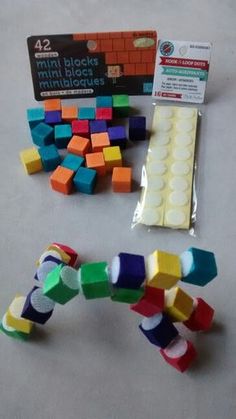 several different colored blocks are on the table