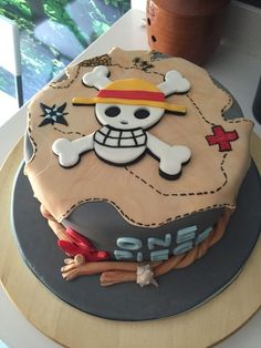 a birthday cake with a pirate theme on it