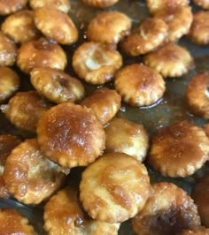 some fried food is being cooked in a frying pan