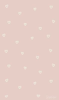 a pink background with white hearts on it