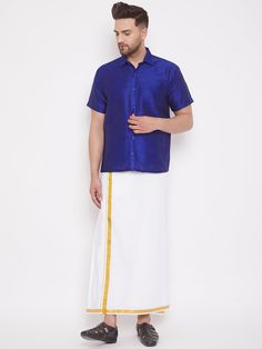 VM By VASTRAMAY Men's Blue And White Silk Blend Shirt And Mundu Set This elegant shirt and mundu set from VASTRAMAY is perfect for traditional occasions. Made from a silk blend, it offers a comfortable and stylish option for men looking to wear traditional Indian attire. Key Features Stylish blue and white color combination Made from a high-quality silk blend Comfortable fit suitable for traditional occasions Easy to wear and manage Specifications Brand: VASTRAMAY Set: Shirt and Mundu Color: Blu Traditional Festive Shirt For Formal Occasions, Traditional Blue Short Sleeve Set, Short Sleeve Traditional Wear For Festivals, Traditional Short Sleeve Wear For Festivals, Traditional Short Sleeve Festive Shirt, Traditional Wear With Short Sleeve And Pallu, Traditional Short Sleeve Sets For Ceremonies, Traditional Festive Short Sleeve Shirt, Festive Traditional Wear With Short Sleeves