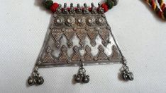 Vintage 1980s Handmade Rare Real Old High grade 80% Sterling silver Rajasthan Tribal banjara Artisan Pendant 26 inches longer adjustable New Cotton Multi Color Threaded Necklace Made By someone else. Discovered and collected by me. Primary Color of Pendant is vintage Silver, Pre- Owned Old looks. Weight of Necklace is 70 gms. Length of Pendant is 9 cm.with loop and dangles. Width of Pendant is 9.6 cm. It's a totally handmade Real old rajasthan tribal Necklace Vintage Silver Beaded Necklaces For Festive Occasions, Vintage Silver Beads Necklace For Festivals, Handmade Vintage Temple Necklace For Rituals, Vintage Silver Necklaces For Rituals, Handmade Vintage Temple Necklace For Ceremonial Occasions, Vintage Handmade Temple Necklace For Ceremonial Occasion, Handmade Temple Jewelry Necklace For Festival, Traditional Metal Temple Necklace With Pendant, Ceremonial Silver Temple Necklace With Latkans